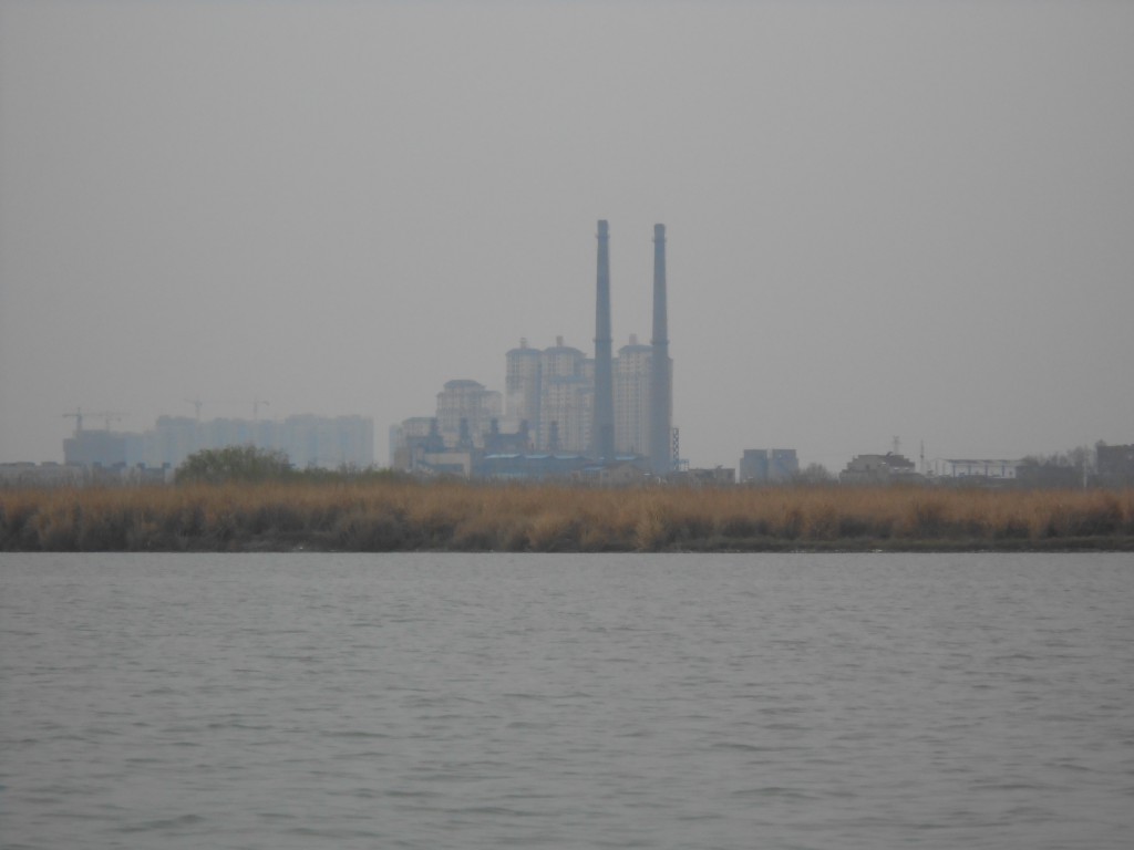 A coal power plant on the banks of the Han River in Xiangyang. China’s current energy plan calls for increased use of coal energy, which will worsen air quality and increase environmental and health problems. 