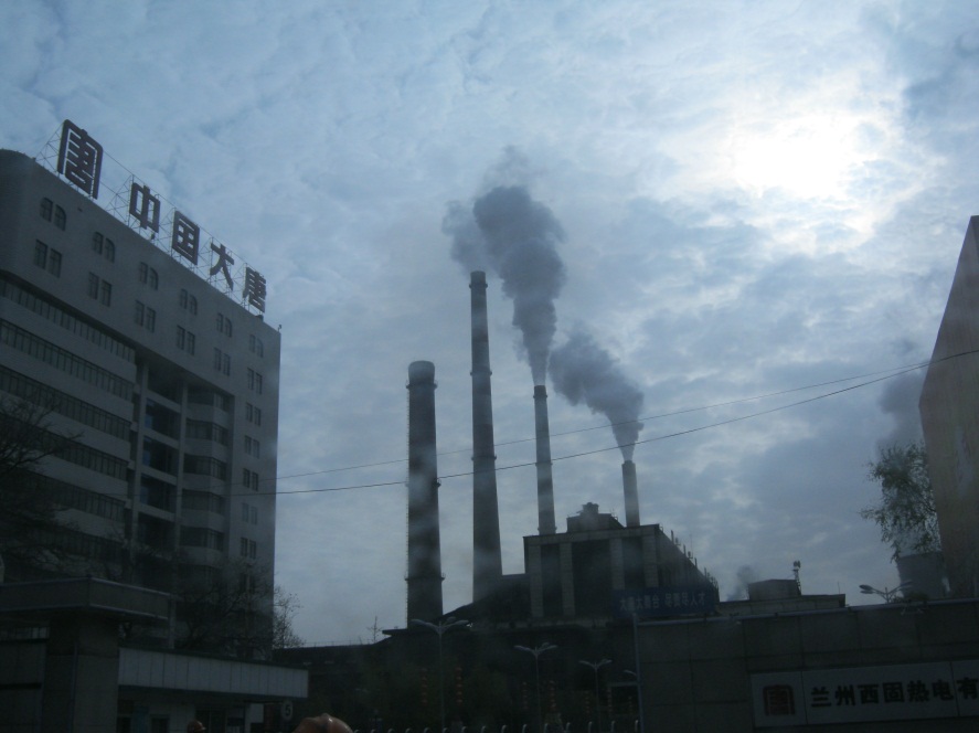 Xigu Thermal Power Plant towers over Lanzhou.